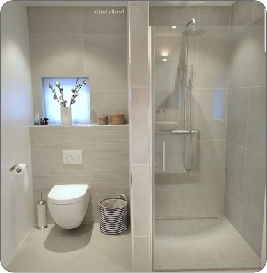 Comfortable office with plants, wooden desk, and two black chairs